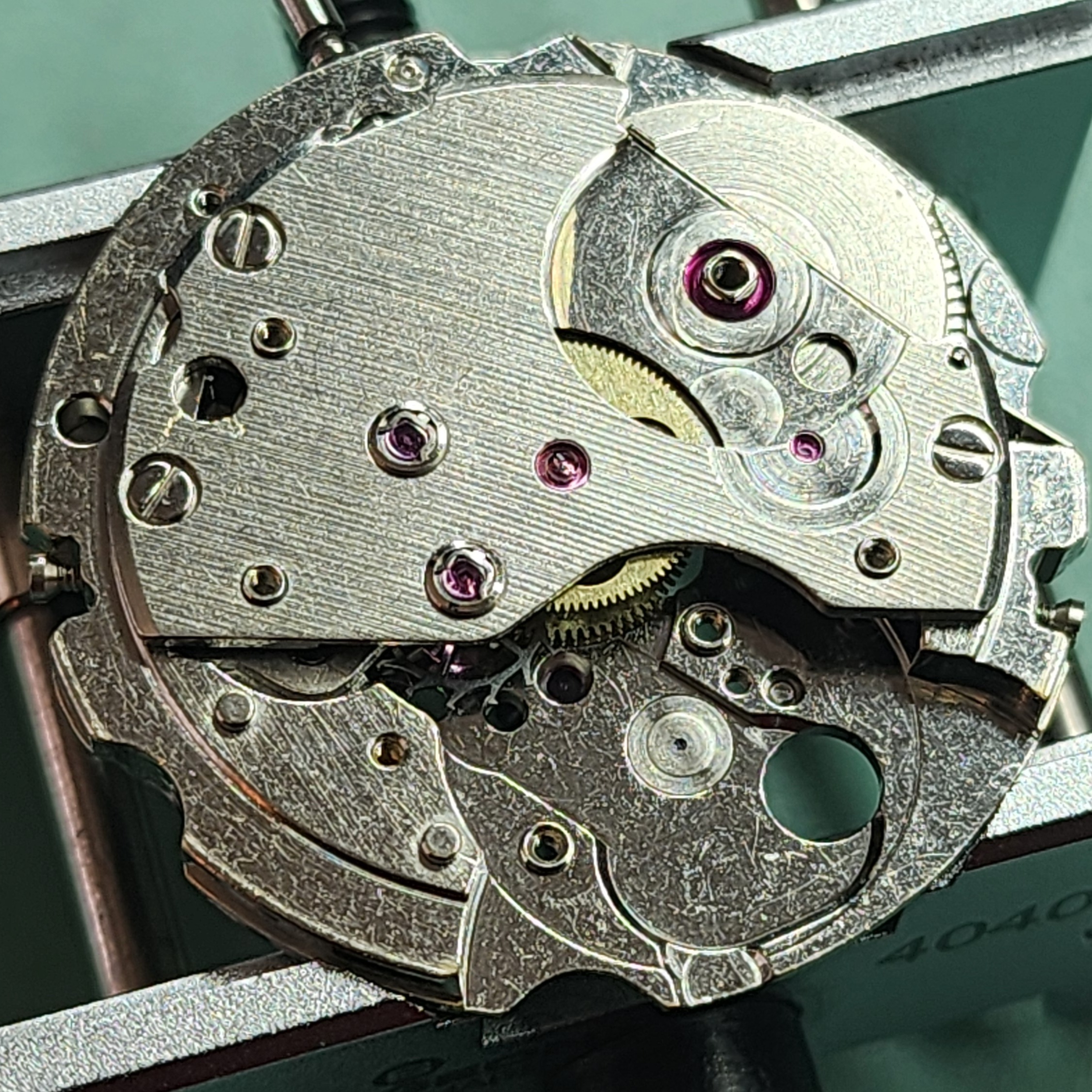 6306 bridge with additional jewels and barrel arbor jeweling